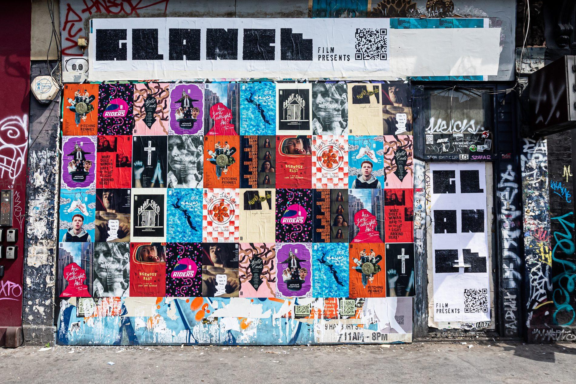 The Glance Film poster wall on Brick Lane